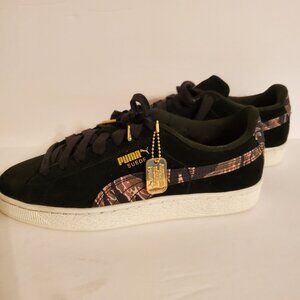 Puma women's black and camo combat shoes. Size 8.